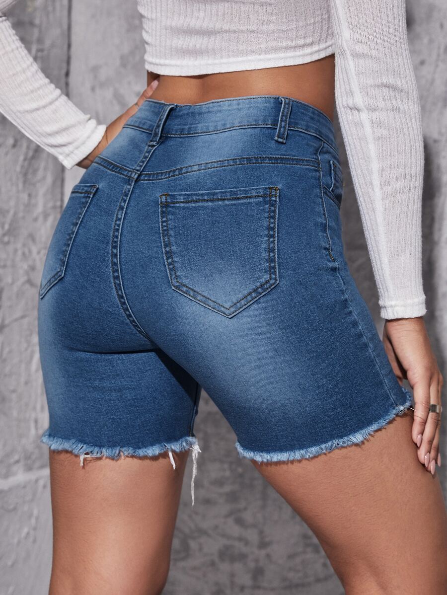 SHEIN Essnce Ripped Raw Hem Denim Shorts